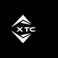 XTC abstract monogram shield logo design on black background. XTC creative initials letter logo