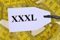 Xxxl label in close up on centimeter