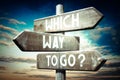 Which way to go? - wooden signpost, roadsign with three arrows Royalty Free Stock Photo