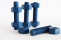 Xylan bolt and nut in blue coated with PTFE Royalty Free Stock Photo