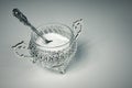 Xylitol in a metal decorative bowl with a rose-shaped spoon. Xylitol, a substitute for birch sugar for diabetics. A beautiful Royalty Free Stock Photo