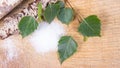 Xylitol - sugar substitute. Birch sugar on wooden background.