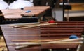 Xylophone or marimba up close with mallets at rest