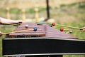 Xylophone with playing hands. Red marimba xylophone. Music percussion instrument. Royalty Free Stock Photo