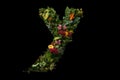 Y alphabet letter made out of leaves plants and flowers isolated on black background illustration generative ai Royalty Free Stock Photo