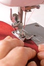 The y woman sews on sewing machine Royalty Free Stock Photo