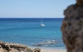 Yacht in Aegean sea. Clear blue water on a beach with boat. Royalty Free Stock Photo