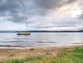 Yacht on an anchor at harbor, boats series Royalty Free Stock Photo