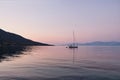 Yacht Anchored in Gulf of Corinth Bay at Dawn, Greece Royalty Free Stock Photo