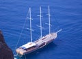 Yacht anchored to shore in Greece, Santorini Island Royalty Free Stock Photo