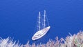 Yacht anchored to shore in Greece, Santorini Island Royalty Free Stock Photo