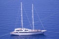 Yacht anchored to shore in Greece, Santorini Island Royalty Free Stock Photo