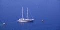 Yacht anchored to shore in Greece, Santorini Island Royalty Free Stock Photo