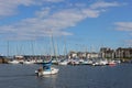 Yacht arriving in Tayport harbour, Fife, Scotland