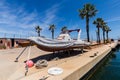 A yacht awaiting repair or storage of yachts on the shore.