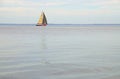 Yacht Beige-Brown Sail Horizon Calm Water Royalty Free Stock Photo