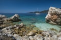 Yacht boat in Agiofili beach near port of Vasiliki with emerald crystal clear sea, Lefkada island, Ionian, Greece Royalty Free Stock Photo