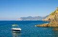 Yacht boat sail on water of Ligurian and Mediterranean Sea near coastline of Riviera di Levante of National park Cinque Terre Royalty Free Stock Photo