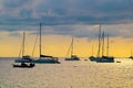 Yacht boat sailing boats or Travel boats in Beautiful open sea at sunset golden sky Amazing for summer holiday background and Royalty Free Stock Photo