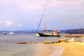 Yacht boats, pier and sand beach, Mediterranean Sea, Greece Royalty Free Stock Photo