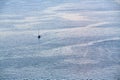 Yacht float in ocean and calm deep sea. Evening seascape idea. Nature landscape and water texture concept, copy space