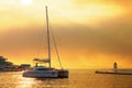 Yacht getting ready to be moored in the harbor of Postira - Croatia, island Brac