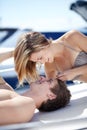 Yacht, happy couple and love on a boat of young woman and man together in summer on holiday. Bikini, vacation break and Royalty Free Stock Photo