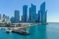 Yacht harbor and lake-side tall buildings