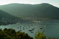 Yacht ih harbour of Komiza in the morning