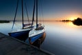 Yacht on lake harbor at sunrise