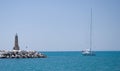 Yacht and lighthouse. Spain. Royalty Free Stock Photo