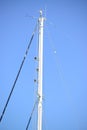 Yacht mast against blue sky Royalty Free Stock Photo