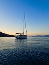 Yacht Moored in Bay, Dawn to Sunrise Light, Greece Royalty Free Stock Photo