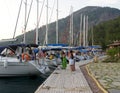 Yacht moored on a pier. Ekincik touristic of Mediterranean sea. Turkish riviera. Yacht-charter. Rest on a water. Holidays on a sea