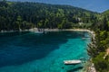 Yacht moored in secluded idyllic greek bay