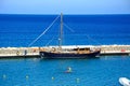 Yacht moored in small harbour, Agios Nikolaos.
