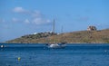 Yacht moored at a stone quay at Vourkari Tzia, Kea island, Greece