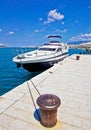 Yacht on mooring bollard dock Royalty Free Stock Photo