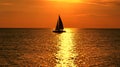 Yacht at orange sunset on the sea Royalty Free Stock Photo