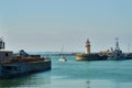 A yacht passes the Ramsgate Lighthouse as it leaves the Royal Harbour.