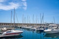 Yacht pier with many boats on a summer day