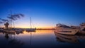 Yacht port and beautiful sunset over Varna, Bulgaria. Sailboat harbor, many beautiful moored sail yachts in the sea