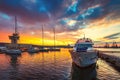 Yacht port and beautiful sunset over Varna, Bulgaria. Sailboat harbor, many beautiful moored sail yachts in the sea