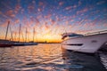 Yacht port and beautiful sunset over Varna, Bulgaria. Sailboat harbor, many beautiful moored sail yachts in the sea