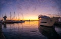Yacht port and beautiful sunset over Varna, Bulgaria. Sailboat harbor, many beautiful moored sail yachts in the sea Royalty Free Stock Photo