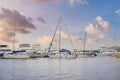 Yacht sailing against sunset. Holiday lifestyle landscape with skyline sailboat and sunset silhouette. Yachting tourism