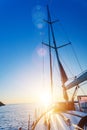 Yacht Sailing against sunset. Sailboat. Travel Concept