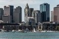 Yacht and sailing boats on Charles River in front of Boston Skyline in Massachusetts USA on a sunny summer day Royalty Free Stock Photo