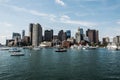 Yacht and sailing boats on Charles River in front of Boston Skyline in Massachusetts USA on a sunny summer day Royalty Free Stock Photo