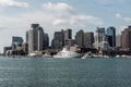 Yacht and sailing boats on Charles River in front of Boston Skyline in Massachusetts USA on a sunny summer day Royalty Free Stock Photo